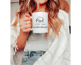 "Mind Your Own Motherhood" design on a white ceramic coffee mug