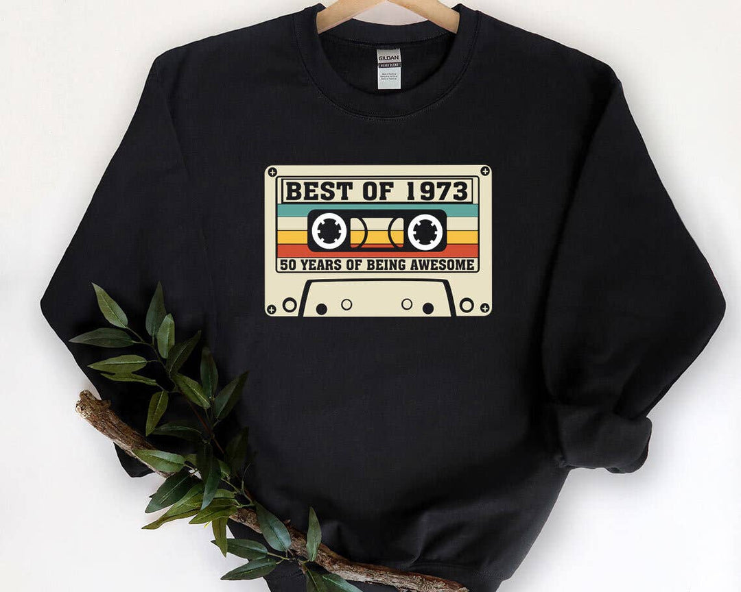 "Best Of 1973" design, alternate view, on an ash gray unisex crewneck sweatshirt