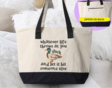 "Whatever Life Throws At You" design on a natural canvas zippered tote bag