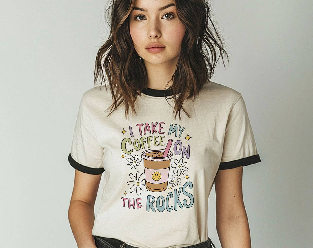 "I Take My Coffee On The Rocks" design on a natural ringer t-shirt with black contrast trim