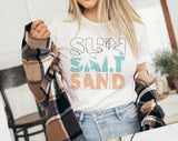 "Sun Salt Sand" design on a white unisex t-shirt