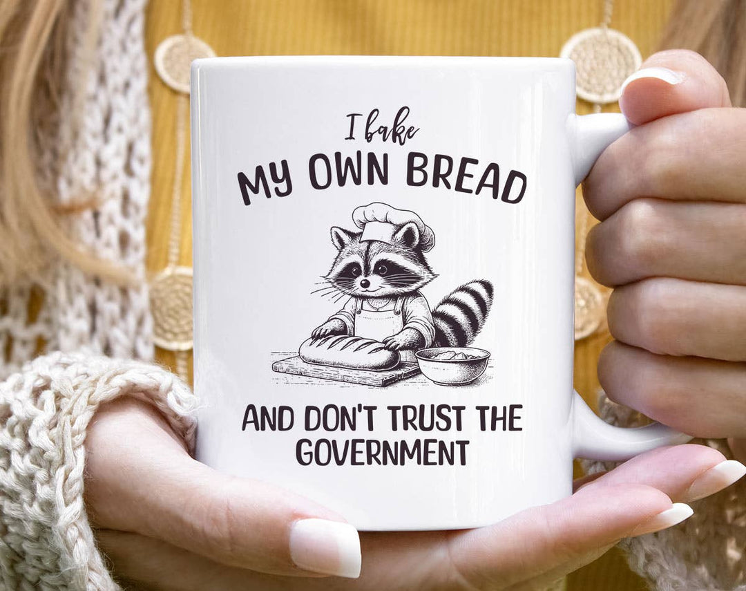 "I Bake Bread & Don't Trust Government" design on a white ceramic coffee mug
