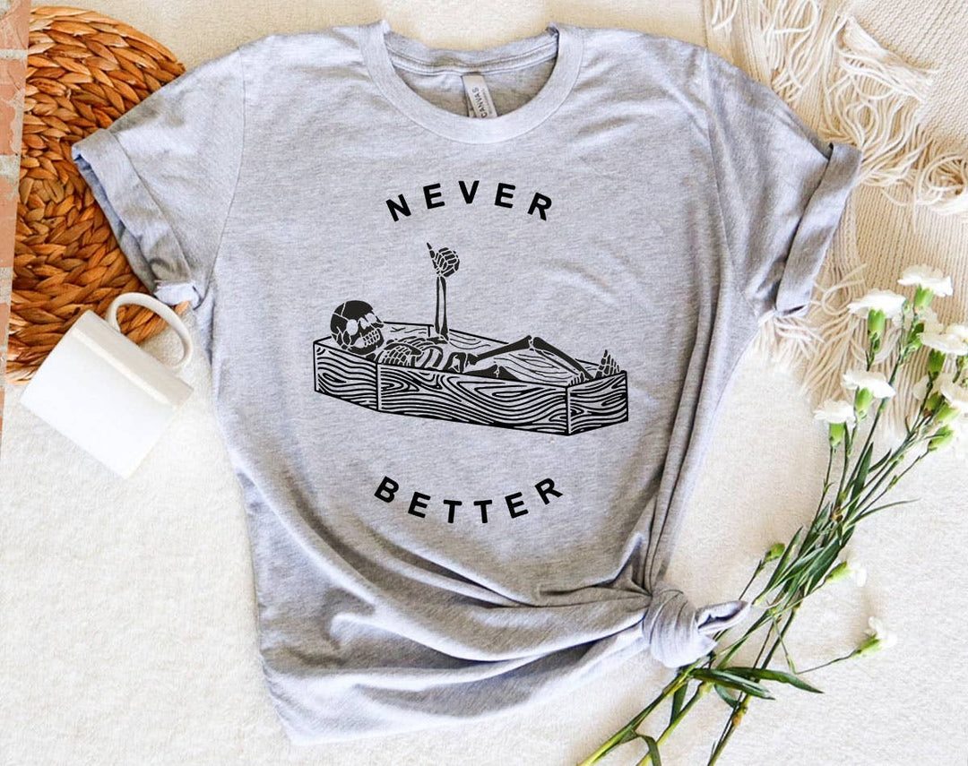"Never Better Skeleton Coffin" design on a heather gray unisex t-shirt