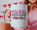 "Teaching Sweethearts 2024" design on a white ceramic coffee mug