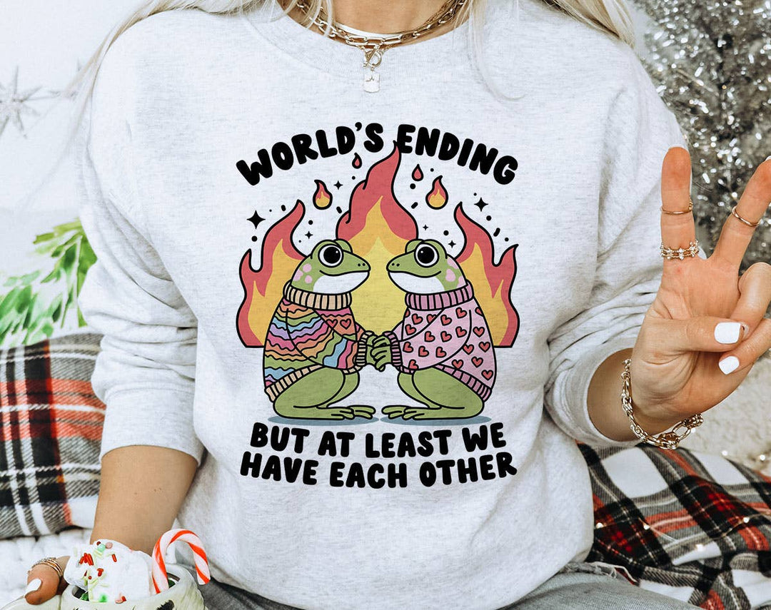 "Worlds Ending Frog Love" design on an ash gray unisex crewneck sweatshirt