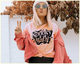 "Spooky Babe Bats" design on a peach unisex t-shirt