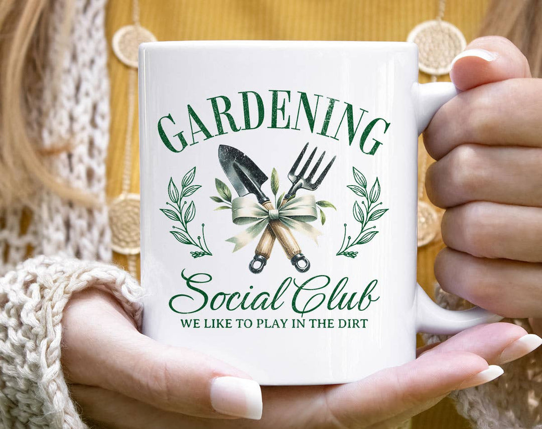 "Gardening Social Club" design on a white ceramic coffee mug