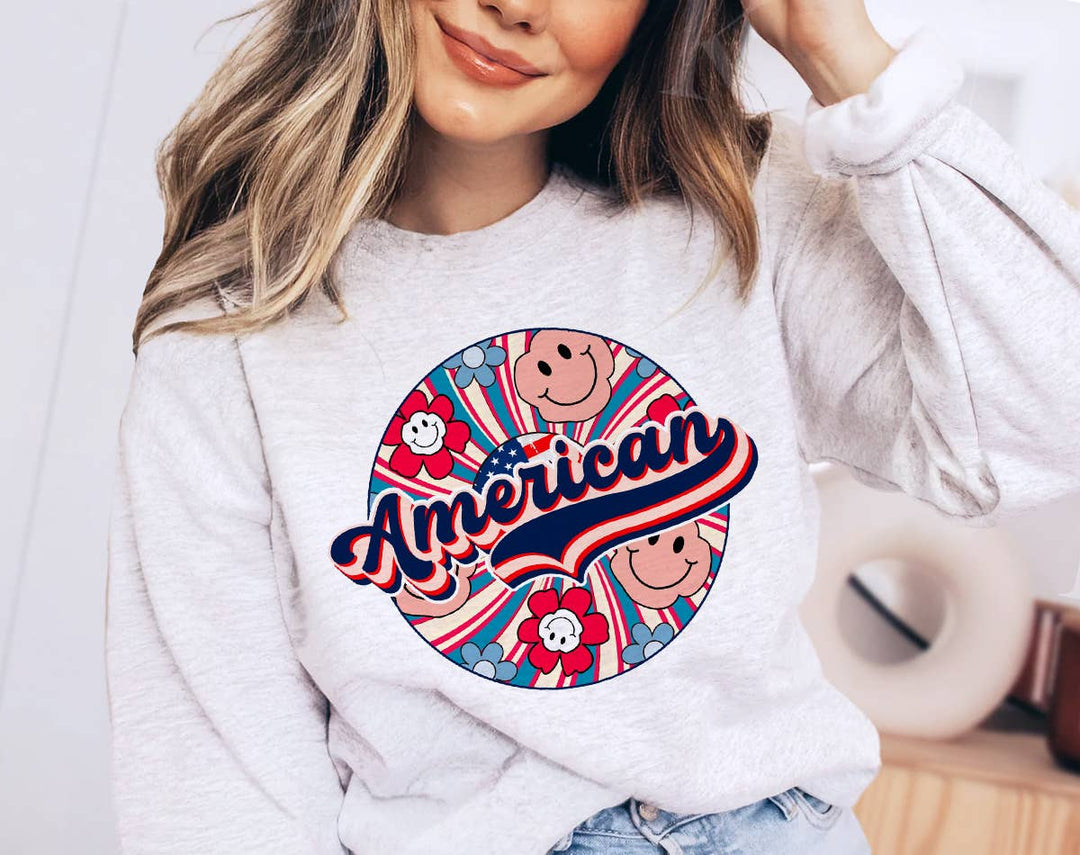 "4th of July American Swirl Flower" design on an ash gray unisex crewneck sweatshirt