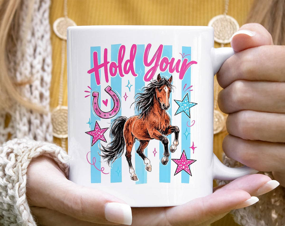"Hold Your Horses" design on a white ceramic coffee mug