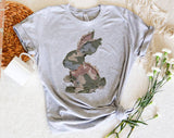 "Camo Bunny Patchwork" design on a heather gray unisex t-shirt