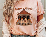 "Gilmore Ghouls" design on a peach unisex t-shirt