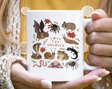 "Love The Unloved Weird Animals Biology Teacher" design on a white ceramic coffee mug