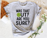 "Was That Out? Are You Sure? Pickleball" design on a heather gray unisex t-shirt