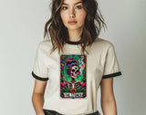 "The Stoner Tarot Skeleton" design on a natural ringer t-shirt with black contrast trim