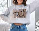 "Coffee Addict Striped Bow" design on an ash gray unisex crewneck sweatshirt