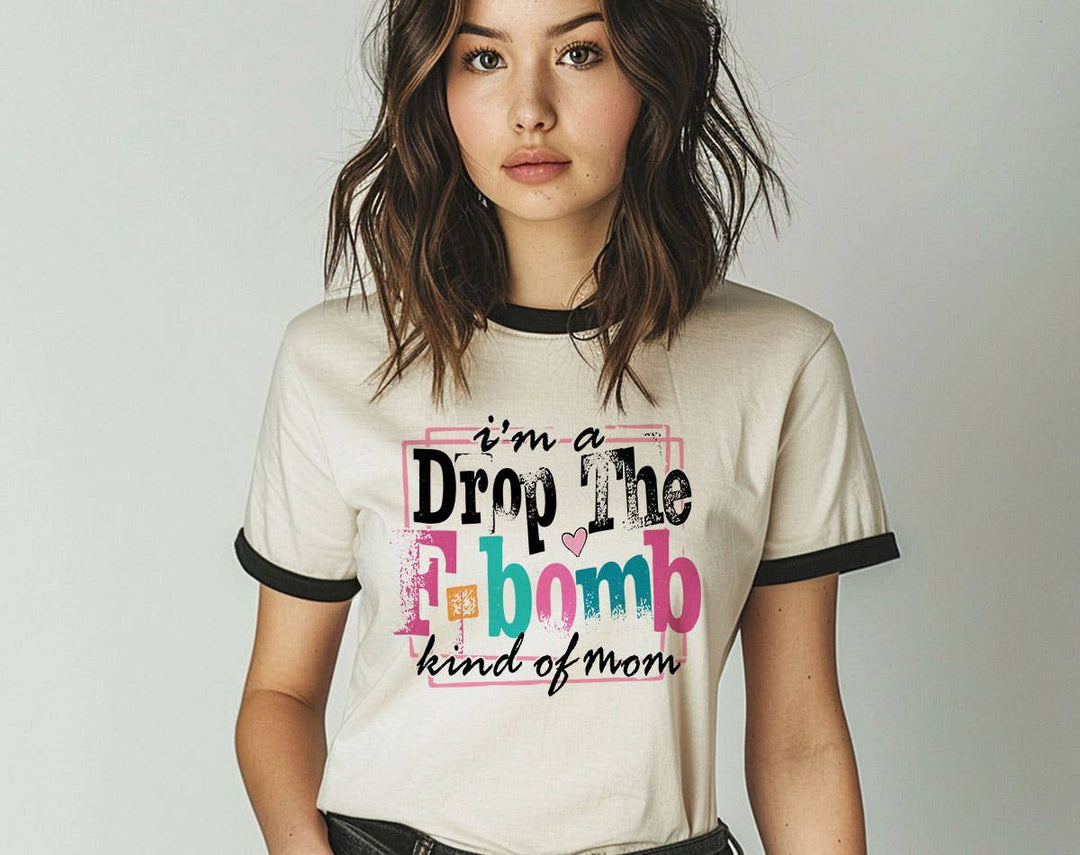 "I'm A Drop The F-Word Kind Of Mom" design on a natural ringer t-shirt with black contrast trim