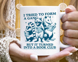 "I Tried To Form A Gang Book Club" design on a white ceramic coffee mug