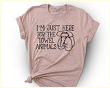 "I'm Just Here For The Towel Animals" design on a peach unisex t-shirt