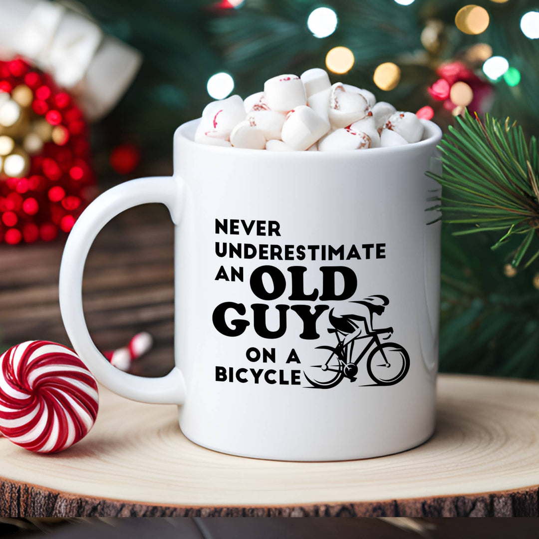 "Bicyclist" design on a white ceramic coffee mug