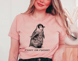 "Fight Or Flight Penguin" design on a peach unisex t-shirt