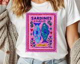 "Sardines Purple Stamp" design on a white unisex t-shirt