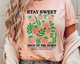 "Stay Sweet Strawberries" design on a peach unisex t-shirt