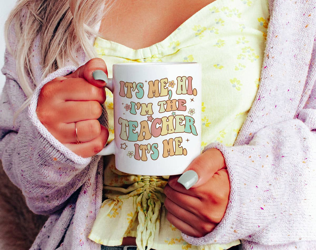 "I'm The Teacher" design on a white ceramic coffee mug
