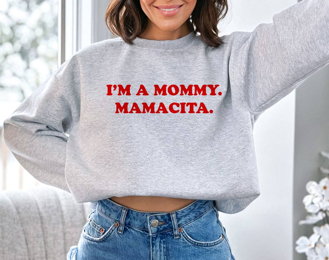 "I'm A Mommy. Mamacita Love Island" design on an ash gray unisex crewneck sweatshirt