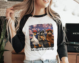 "Bad Day To Be A Hotdog" design on a white baseball raglan tee with black sleeves