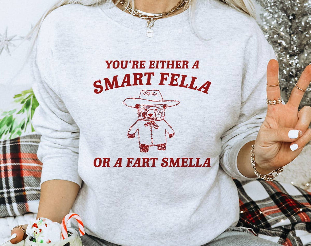 "Smart Fella Or Fart Smella" design on an ash gray unisex crewneck sweatshirt