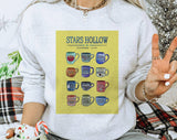 "Stars Hollow Coffee Cups" design on an ash gray unisex crewneck sweatshirt