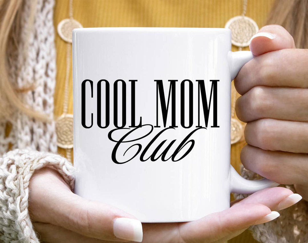 "Cool Mom Club" design on a white ceramic coffee mug