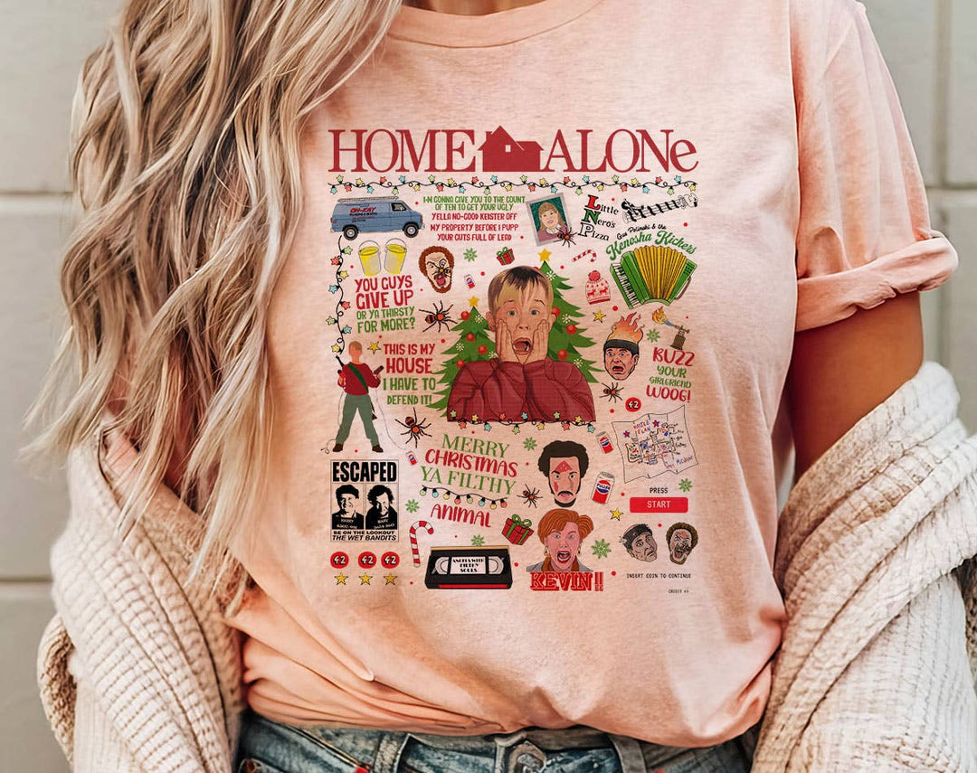 "Home Alone Christmas Collage" design on a peach unisex t-shirt