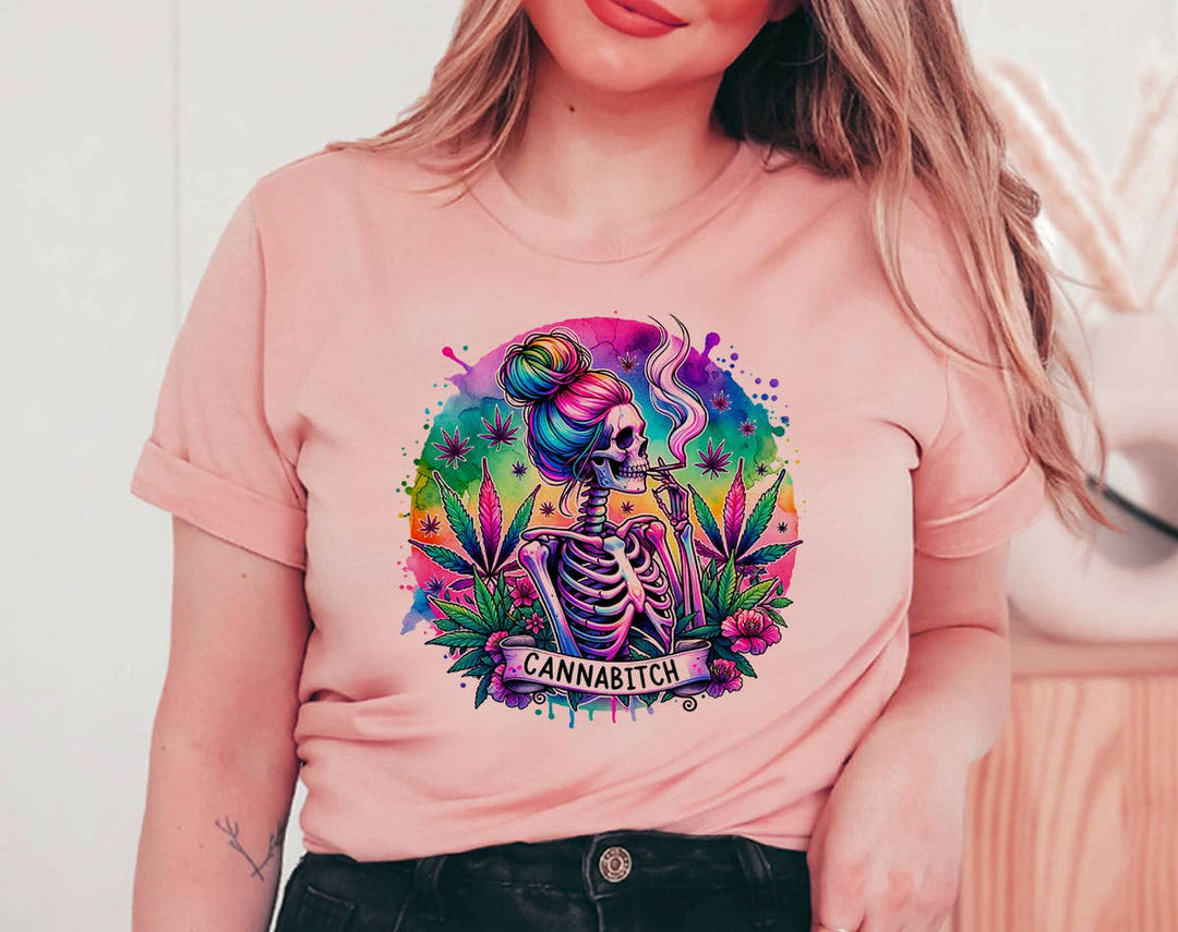 "Cannabitch Skeleton Hippie" design on a peach unisex t-shirt