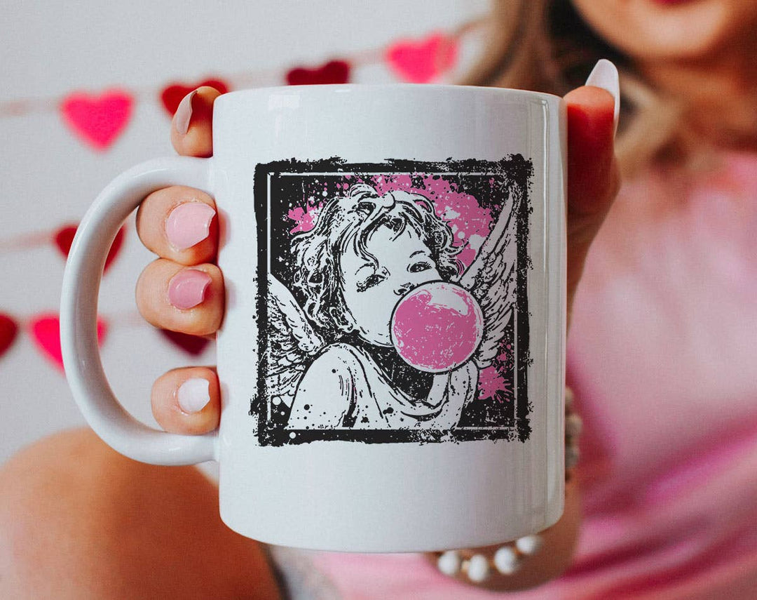"Cupid Bubblegum Stamp" design on a white ceramic coffee mug