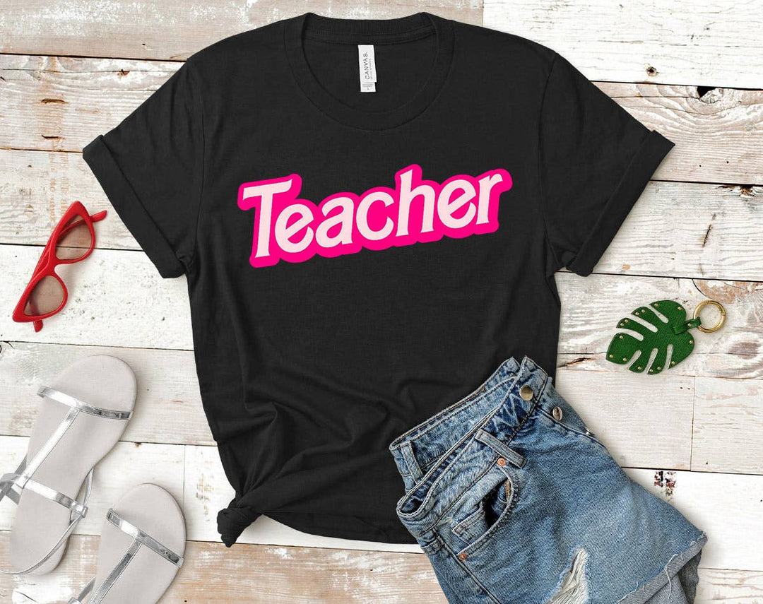 "Teacher Pink Logo" design on a black unisex t-shirt