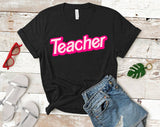 "Teacher Pink Logo" design on a black unisex t-shirt
