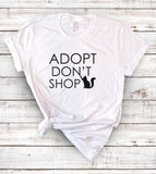 "Adopt Don't Shop" design on a white unisex t-shirt