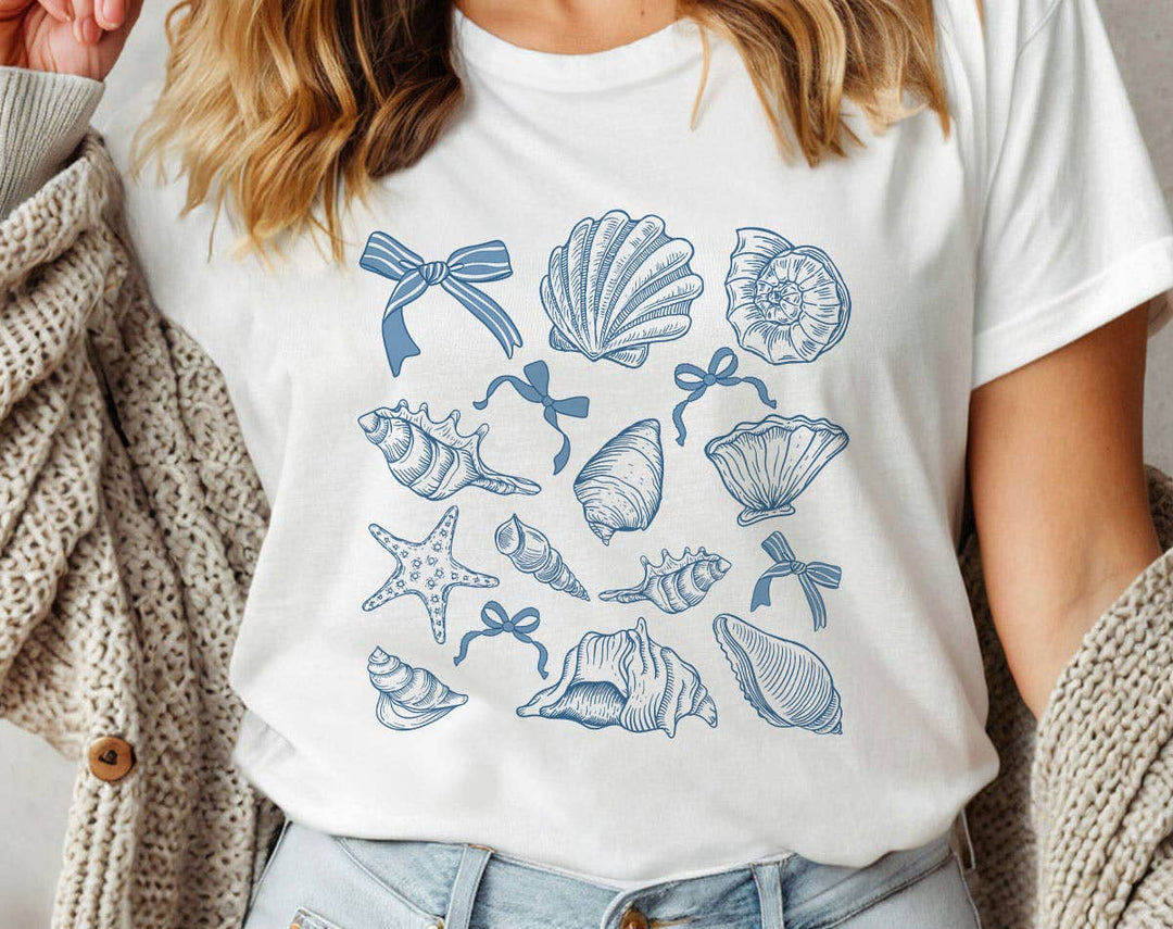 "Seashell Blue Beach Collage" design on a white unisex t-shirt