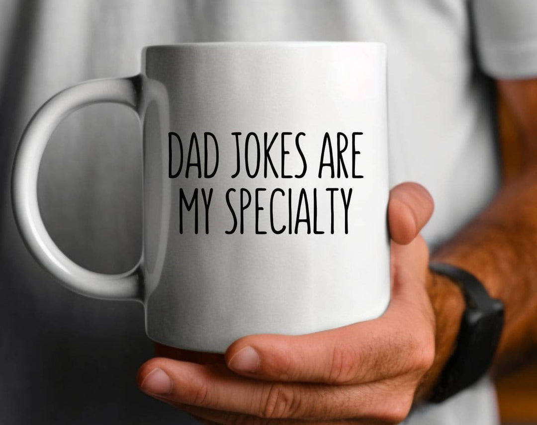 "Dad Joke Specialty" design on a white ceramic coffee mug