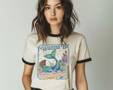 "I Wanna Be Where The People Aren't Mermaid" design on a natural ringer t-shirt with black contrast trim