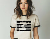 "Everything Is Fine Trust Your Government" design on a natural ringer t-shirt with black contrast trim