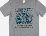 "I Tried To Form A Gang Book Club" design on a heather gray unisex t-shirt