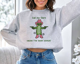 "Call Me Darn Cause I've Been Tootin" design on an ash gray unisex crewneck sweatshirt