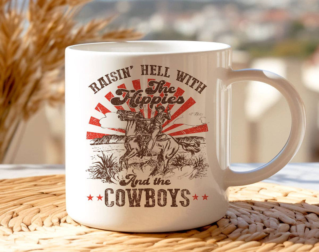 "Raisin Hell With Hippies & Cowboys" design on a white ceramic coffee mug