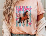 "Hold Your Horses Striped" design on a peach unisex t-shirt