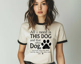 "All I Need Is This Dog And That Dog" design on a natural ringer t-shirt with black contrast trim