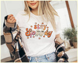 "Stay Spooky Ghost" design on a white unisex t-shirt