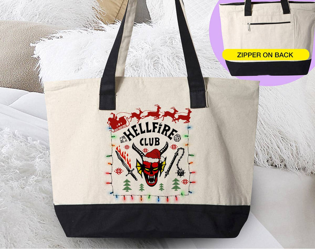 "Christmas Hellfire Club" design on a natural canvas zippered tote bag