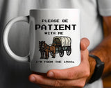 "Please Be Patient, I'm From The 1900's" design on a white ceramic coffee mug
